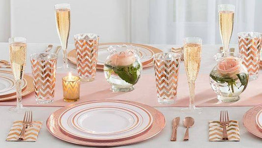 Elegant table setting with fancy disposable dinnerware for a stylish event.