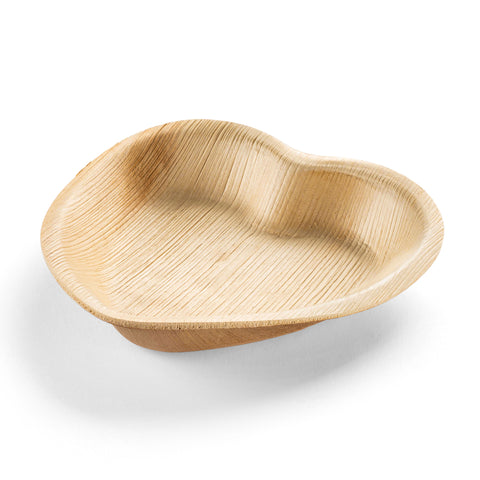 A heart-shaped wooden bowl featuring a smooth, light brown finish with visible wood grain that adds texture and a natural look. Photographed on a white background to emphasize its shape and details, the bowl is displayed alongside Heart Natural Palm Leaf Eco-Friendly Disposable Salad Plates (6