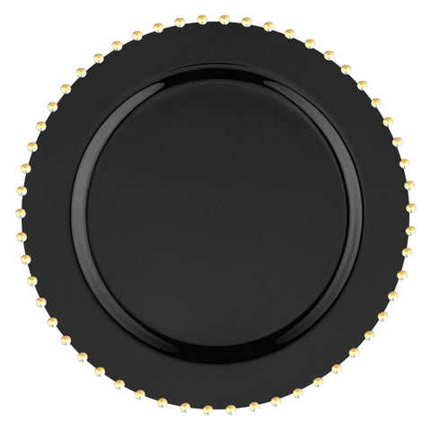 A Black with Gold Pearl String Round Plastic Salad Plate (7”) with a glossy finish and a decorative rim featuring evenly spaced small gold beads around the edge. This exquisite disposable plate, centered on a plain white background, perfectly epitomizes luxury tableware.