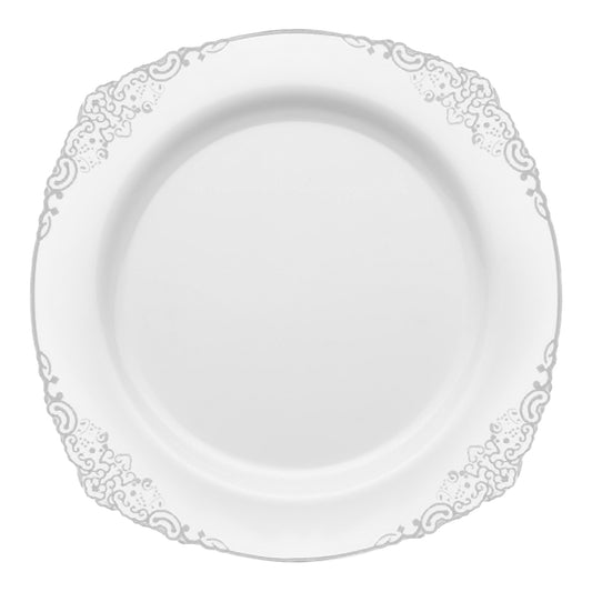 A 10.25-inch round plastic dinner plate in white, featuring an elegant silver floral and swirl pattern along the rim. The design is sophisticated and decorative, enhancing the clean, minimalist look of the plate for an added touch of refinement.